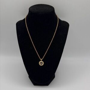 Nina Ricci Gold and Silver Pendant Necklace
